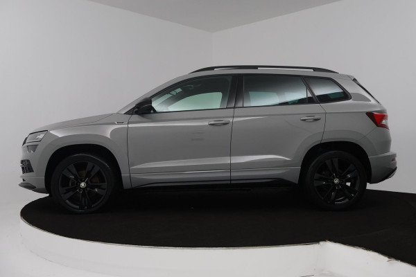 Škoda Karoq 1.5 TSI ACT Sportline Business (PANORAMADAK, DIGITALE COCKPIT, ACHTERUITRIJCAMERA, STOELVERWARMING, CRUISE ADAPTIEF)