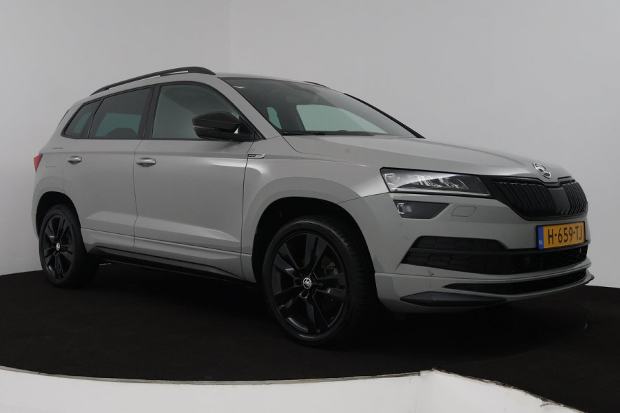 Škoda Karoq 1.5 TSI ACT Sportline Business (PANORAMADAK, DIGITALE COCKPIT, ACHTERUITRIJCAMERA, STOELVERWARMING, CRUISE ADAPTIEF)