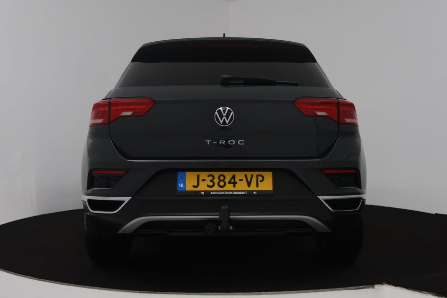 Volkswagen T-Roc 1.0 TSI Style Business (TREKHAAK, PARKEERSENSOREN, CRUISE ADAPTIEF, STOELVERWARMING, NAVIGATIE CARPLAY)