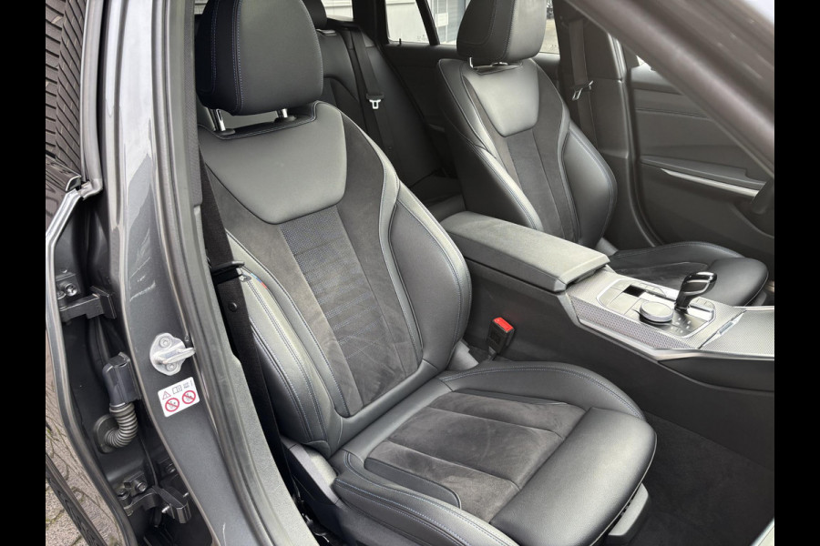 BMW 3 Serie Touring 330e M Sport / Panodak / Alcantara / Laser licht / 20"