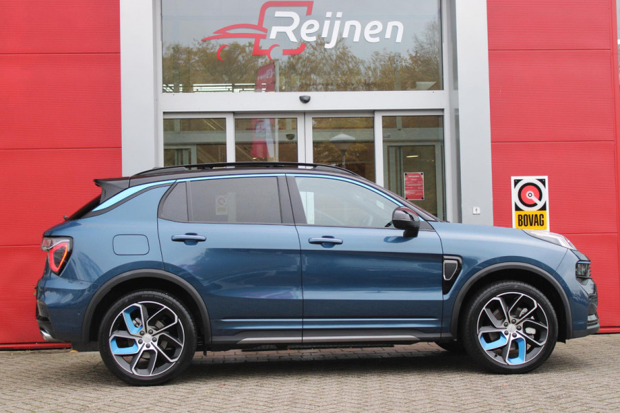 Lynk & Co 01 1.5 261PK PHEV | PANORAMA SCHUIF / KANTELDAK | INFINTY AUDIO | DODEHOEK DETECTIE | NAVIGATIE | DASHBOARD CAMERA | ELEKTRISCHE STOELVERSTELLING MET GEHEUGEN FUNCTIE | DAB+ RADIO | DRAADLOZE APPLE CARPLAY/ANDROID AUTO | DRAADLOZE TELEFOONLADER | ELEKTRISCH BEDIENBARE ACHTERKLEP | STOEL VERWARMING | 360° CAMERA | DODEHOEK DETECTIE | ZWARTE HEMEL BEKLEDING | KEYLESS ENTRY/START | 20" LICHTMETALEN VELGEN |