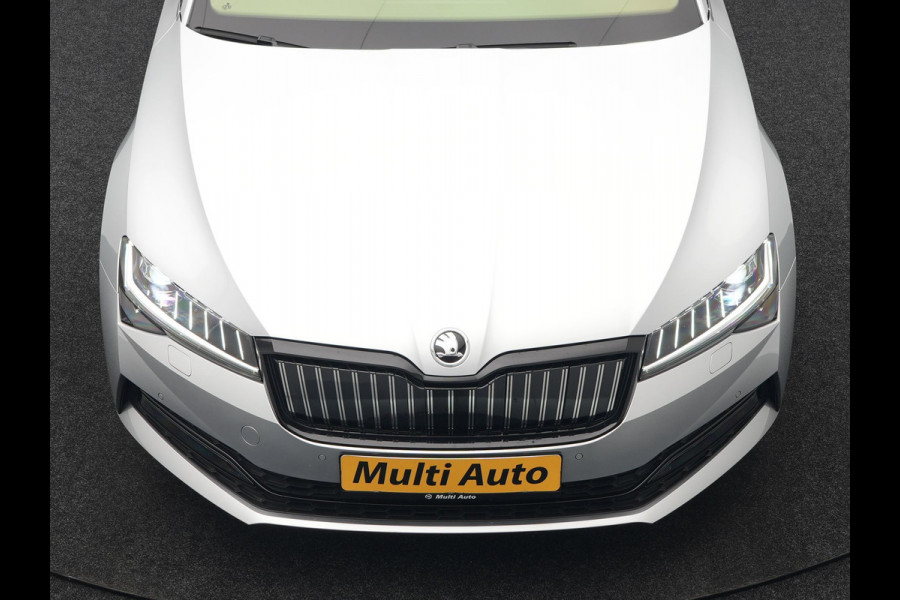 Škoda Superb Combi 1.4 TSI iV Sportline Business Plug In Hybrid 218pk Dealer O.H PHEV | Trekhaak Af Fabriek | Panodak | Adaptive Cruise | Alcantara Sportstoelen Memory & Verwarmd | Sfeerverlichting | Apple Carplay | Stuur Verwarmd | Virtual | Keyless | DAB | 19"L.M |