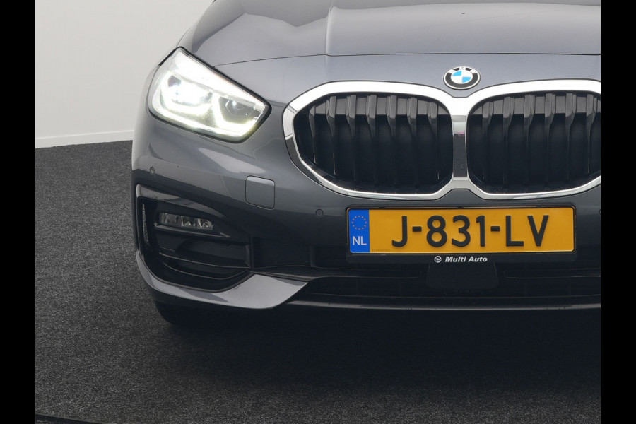 BMW 1-serie 118i Sportline 141pk Dealer O.H | Apple Carplay | Cruise Control | Virtual | Navigatie | LED Koplampen | Sfeerverlichting | DAB | 17"L.M |