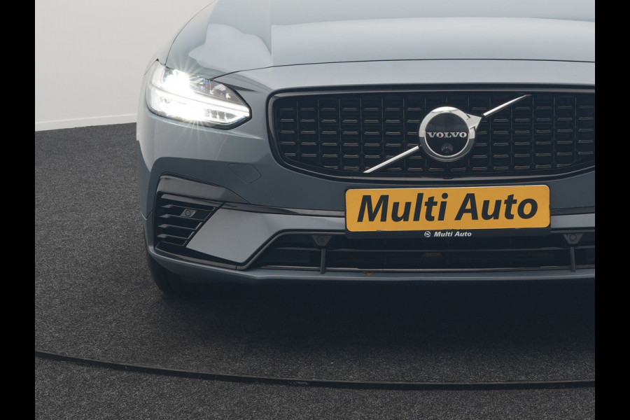 Volvo V90 T6 AWD R-Design Plug In Hybrid 340pk Dealer O.H PHEV | Trekhaak Af Fabriek | Panodak | Adaptive Cruise | Head Up | Harman & Kardon | 360 Camera | Lederen Sporstoelen Memory & Verwarmd | Pilot Assist | Apple Carplay | Navigatie | DAB |