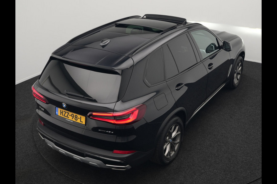 BMW X5 xDrive45e High Executive Plug In Hybrid 395pk Dealer O.H PHEV | Trekhaak Af Fabriek | Luchtvering | Panodak | Head Up | Adaptive Cruise | 360 Camera | Adaptief Onderstel | Lederen Sportstoelen Memory & Verwarmd | Apple Carplay | Sfee