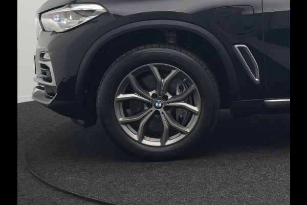 BMW X5 xDrive45e High Executive Plug In Hybrid 395pk Dealer O.H PHEV | Trekhaak Af Fabriek | Luchtvering | Panodak | Head Up | Adaptive Cruise | 360 Camera | Adaptief Onderstel | Lederen Sportstoelen Memory & Verwarmd | Apple Carplay | Sfee