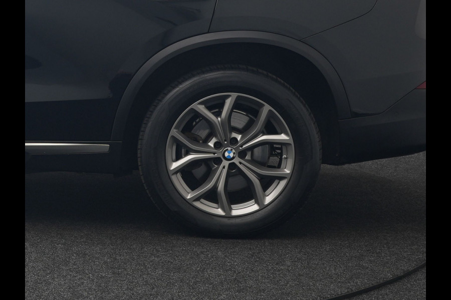 BMW X5 xDrive45e High Executive Plug In Hybrid 395pk Dealer O.H PHEV | Trekhaak Af Fabriek | Luchtvering | Panodak | Head Up | Adaptive Cruise | 360 Camera | Adaptief Onderstel | Lederen Sportstoelen Memory & Verwarmd | Apple Carplay | Sfee