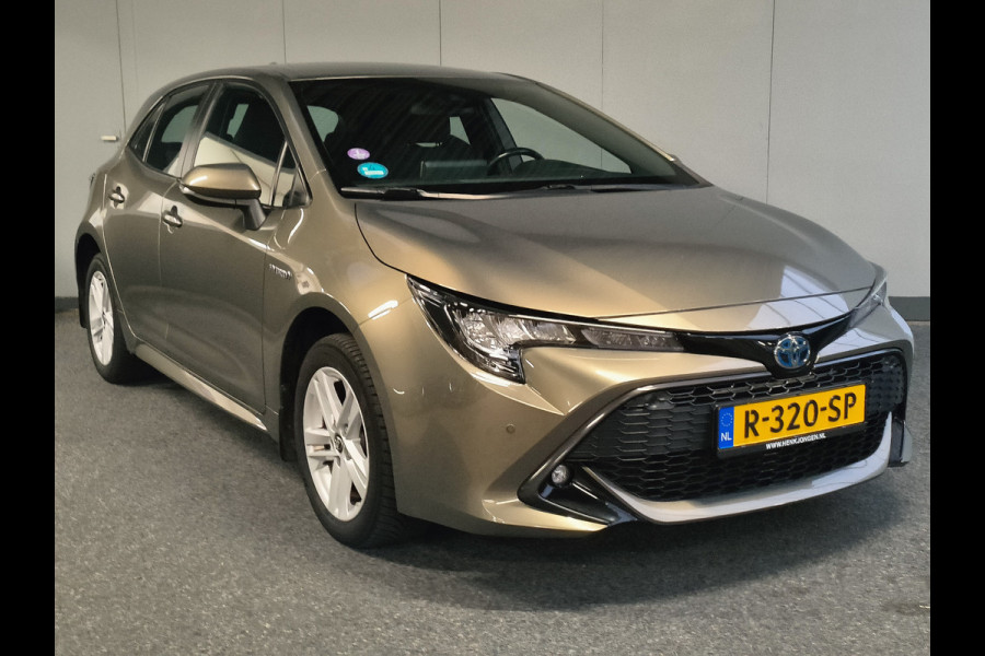 Toyota Corolla 1.8 Hybrid Active Rijklaar + 12 maanden Bovag-garantie Henk Jongen Auto's in Helmond,  al 50 jaar service zoals 't hoort!