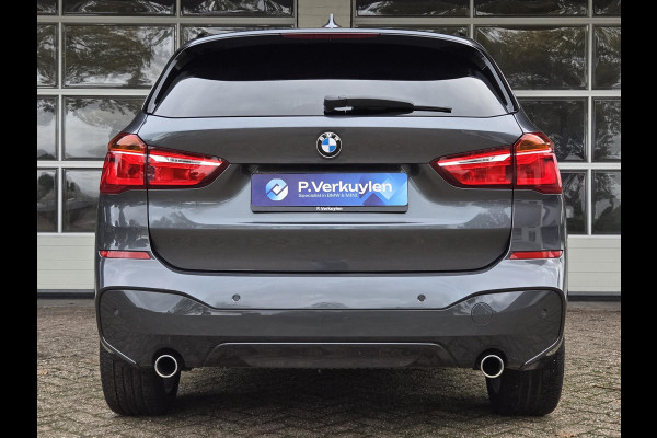 BMW X1 sDrive20i M SPORT | LEDER | TREKHAAK | NAVIGATIE | STOEL- STUURWIELVERWARMING | ELEKTR. KOFFERKLEP |