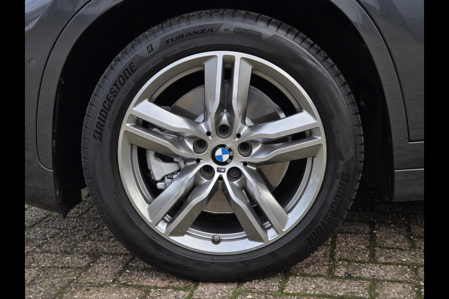 BMW X1 sDrive20i M SPORT | LEDER | TREKHAAK | NAVIGATIE | STOEL- STUURWIELVERWARMING | ELEKTR. KOFFERKLEP |