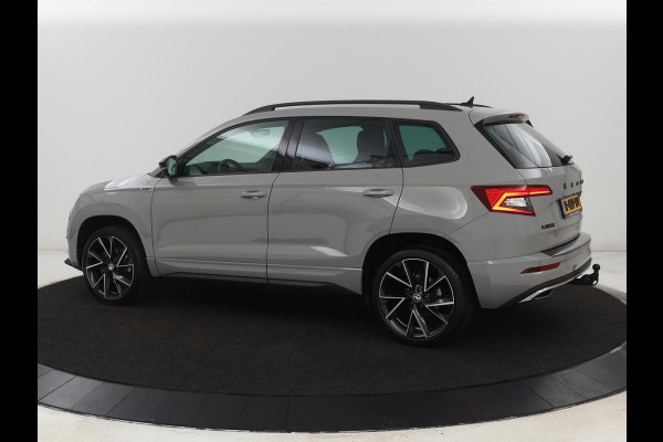 Škoda Karoq 1.5 TSI Sportline | Trekhaak | Stoelverwarming | Camera | Carplay | Virtual Cockpit | Sportstoelen | Navigatie | Full LED | Parkeerhulp | Sfeerverlichting | Climate control | Cruise control