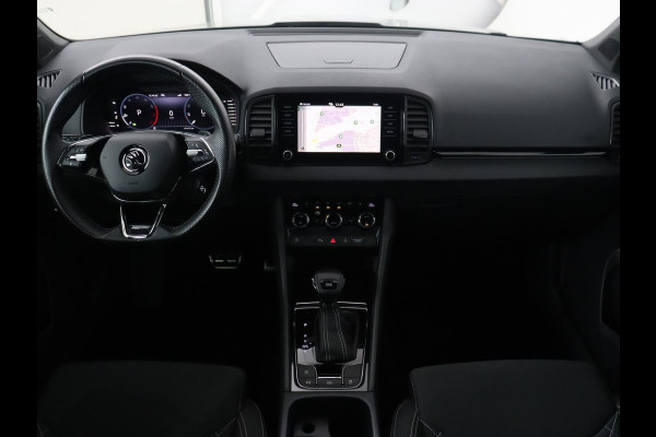 Škoda Karoq 1.5 TSI Sportline | Trekhaak | Stoelverwarming | Camera | Carplay | Virtual Cockpit | Sportstoelen | Navigatie | Full LED | Parkeerhulp | Sfeerverlichting | Climate control | Cruise control