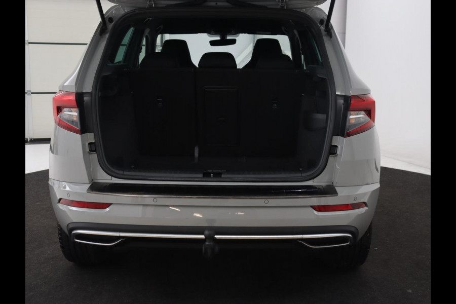 Škoda Karoq 1.5 TSI Sportline | Trekhaak | Stoelverwarming | Camera | Carplay | Virtual Cockpit | Sportstoelen | Navigatie | Full LED | Parkeerhulp | Sfeerverlichting | Climate control | Cruise control