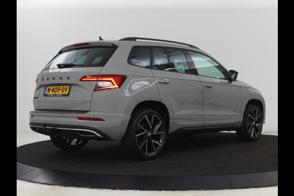 Škoda Karoq 1.5 TSI Sportline | Trekhaak | Stoelverwarming | Camera | Carplay | Virtual Cockpit | Sportstoelen | Navigatie | Full LED | Parkeerhulp | Sfeerverlichting | Climate control | Cruise control