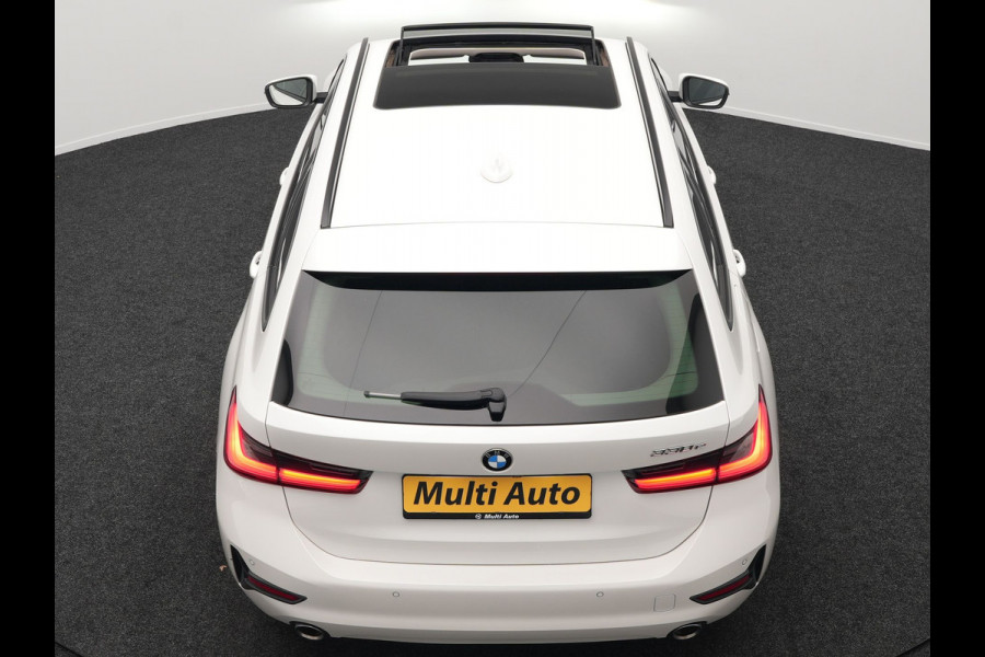 BMW 3 Serie Touring 330e Plug In Hybrid 293pk Dealer O.H PHEV | Trekhaak Af Fabriek | Panodak | Head Up | Adaptive Cruise | Laser LED | Lederen Sportstoelen Memory & Verwarmd | Keyless | Blis | Apple Carplay | Stuur Verwarmd | Navigatie | DAB |