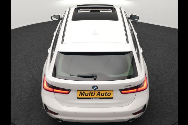 BMW 3 Serie Touring 330e Plug In Hybrid 293pk Dealer O.H PHEV | Trekhaak Af Fabriek | Panodak | Head Up | Adaptive Cruise | Laser LED | Lederen Sportstoelen Memory & Verwarmd | Keyless | Blis | Apple Carplay | Stuur Verwarmd | Navigatie | DAB |