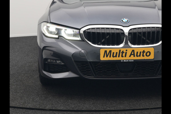 BMW 3 Serie Touring 330e M Sport Plug In Hybrid 293pk Dealer O.H PHEV | Trekhaak Af Fabriek | Panodak | Head Up | Adaptive Cruise | Apple Carplay | Sfeerverlichting | Alcantara Sportstoelen Verwarmd | Navigatie | Virtual | DAB |