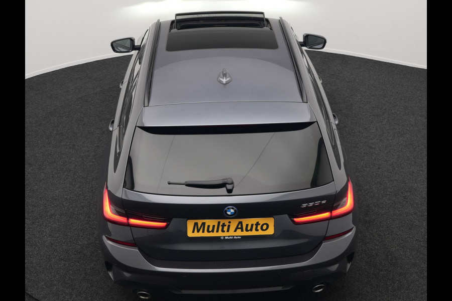BMW 3 Serie Touring 330e M Sport Plug In Hybrid 293pk Dealer O.H PHEV | Trekhaak Af Fabriek | Panodak | Head Up | Adaptive Cruise | Apple Carplay | Sfeerverlichting | Alcantara Sportstoelen Verwarmd | Navigatie | Virtual | DAB |