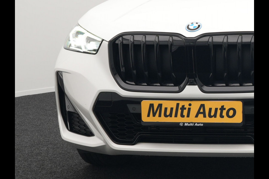 BMW X1 xDrive30e M-Sport Plug In Hybrid 326pk Dealer O.H PHEV | Adaptive Cruise | 360 Camera | Head Up | Adaptive Onderstel | Lederen Sportstoelen Massage & Memory | Harman Kardon | Widescreen Navi | Keyless | Sfeerverlichting |
