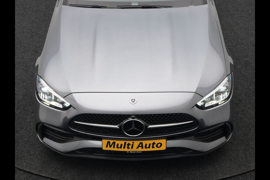 Mercedes-Benz C-Klasse Estate 300 e AMG Night Plug In Hybrid 320pk Dealer O.H. NIEUW MODEL PHEV | Panodak | Trekhaak af Fabriek | Alcantara Sportstoelen Verwarmd | Sfeerverlichting | Navigatie | Apple Carplay | Virtual | Camera | DAB |