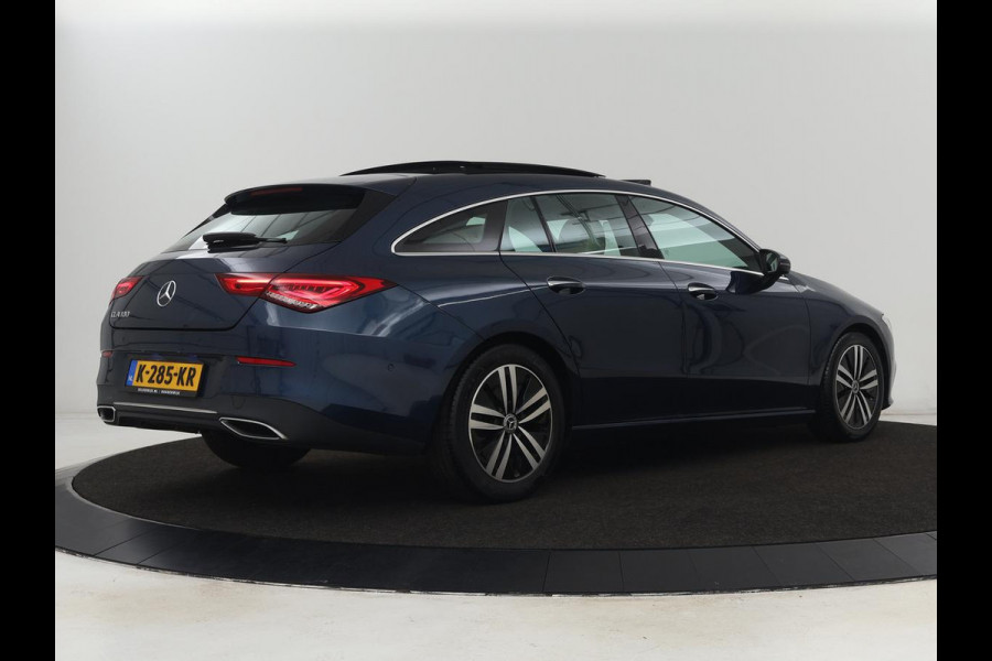 Mercedes-Benz CLA-Klasse 180 Business Solution Luxury | Panoramadak | Leder | Trekhaak | Stoelverwarming | Keyless | Camera | Memory | Matrix LED | Park Assist | Widescreen | Climate control
