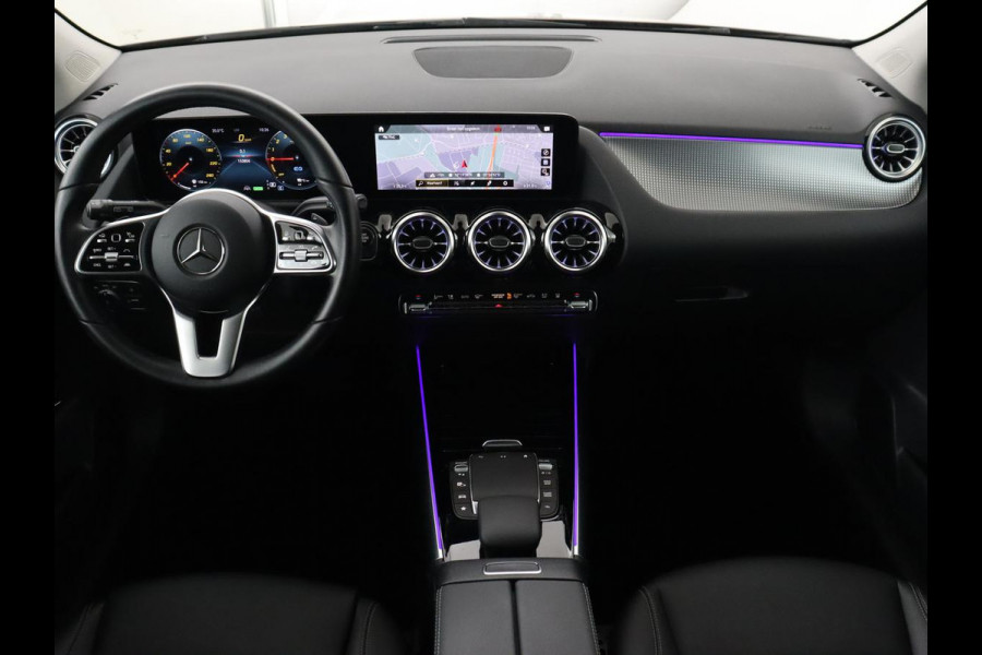 Mercedes-Benz B-Klasse 250e Urban Night | Adaptive cruise | Stoelverwarming | Camera | Carplay | Sfeerverlichting | Half leder | Full LED | Widescreen | Park Assist | Navigatie | PHEV | Plug In