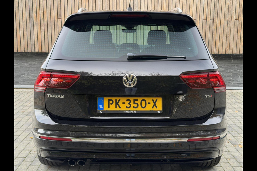 Volkswagen Tiguan 1.4 TSI R-line Handgeschakeld | Half/leer | R-line stuurwiel | LED verlichting | Stoelverwarming | Zwarte hemelbekleding | Apple