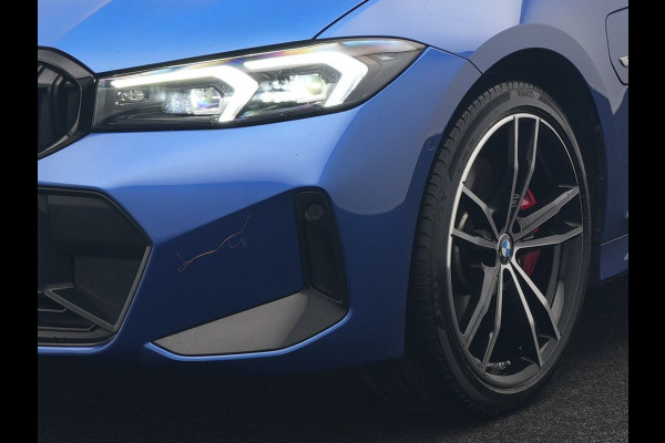 BMW 3 Serie Touring 330e M Sport Pro Plug In Hybrid 292pk Dealer O.H. PHEV | Widescreen Navi | Trekhaak Af Fabriek | Panodak | Adaptive Cruise | Camera |  Alcantara Sportstoelen Memory & Verwarmd | Sfeerverlichting | Apple Carplay | Stuur Verwarmd | Navigatie |