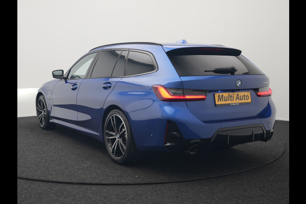 BMW 3 Serie Touring 330e M Sport Pro Plug In Hybrid 292pk Dealer O.H. PHEV | Widescreen Navi | Trekhaak Af Fabriek | Panodak | Adaptive Cruise | Camera |  Alcantara Sportstoelen Memory & Verwarmd | Sfeerverlichting | Apple Carplay | Stuur Verwarmd | Navigatie |