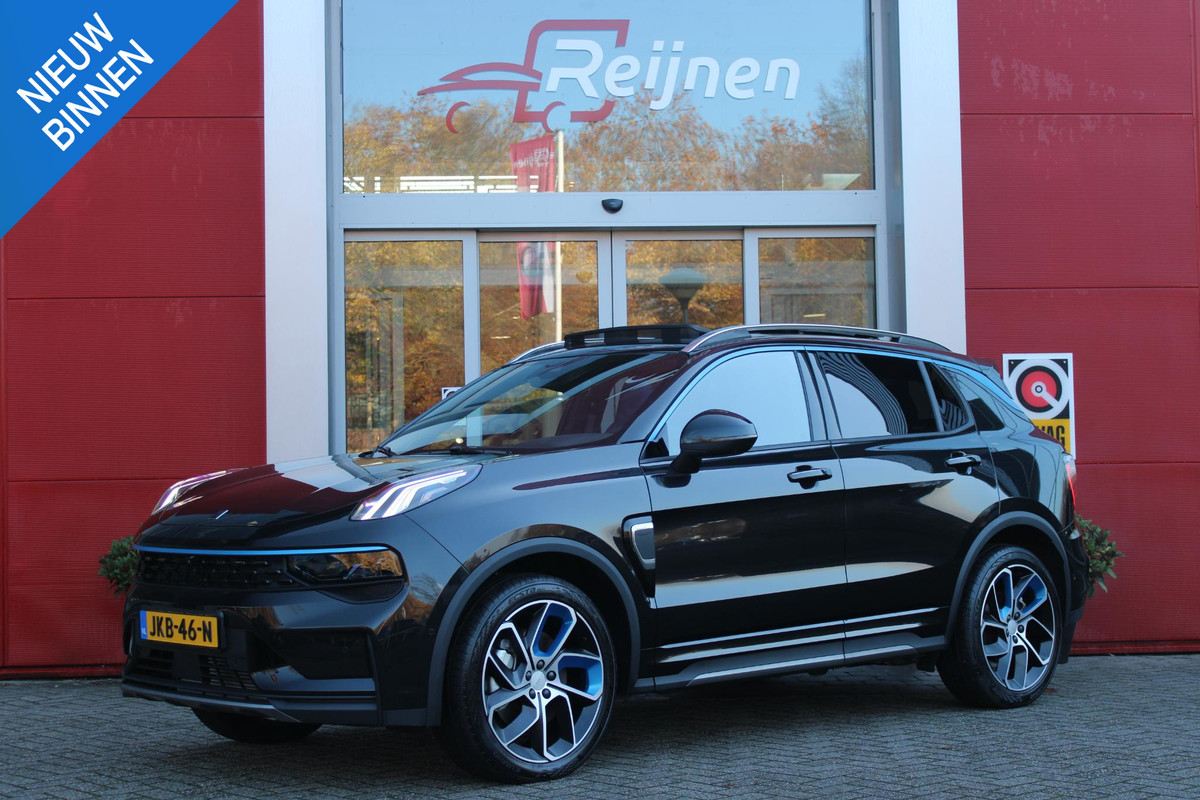 Lynk & Co 01 1.5 261PK PHEV | PANORAMA SCHUIF / KANTELDAK | INFINTY AUDIO | DODEHOEK DETECTIE | NAVIGATIE | DASHBOARD CAMERA | ELEKTRISCHE STOELVERSTELLING MET GEHEUGEN FUNCTIE | DAB+ RADIO | DRAADLOZE APPLE CARPLAY/ANDROID AUTO | DRAADLOZE TELEFOONLADER | ELEKTRISCH BEDIENBARE ACHTERKLEP | STOEL VERWARMING | 360° CAMERA | DODEHOEK DETECTIE | ZWARTE HEMEL BEKLEDING | KEYLESS ENTRY/START | 20" LICHTMETALEN VELGEN |