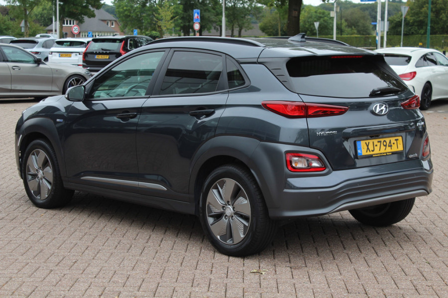 Hyundai Kona EV Premium 64 kWh / SoH 88.6% / Camera / Leder / Head-up / 18'' / Navigatie / Stuur+Stoelverwarming / Keyless / KRELL Audio / DAB / ACC