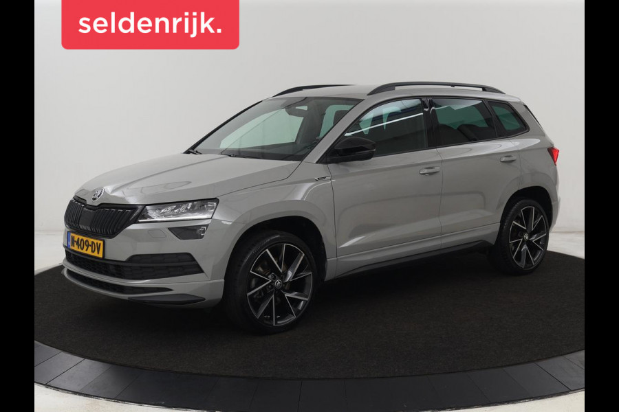 Škoda Karoq 1.5 TSI Sportline | Trekhaak | Stoelverwarming | Camera | Carplay | Virtual Cockpit | Sportstoelen | Navigatie | Full LED | Parkeerhulp | Sfeerverlichting | Climate control | Cruise control