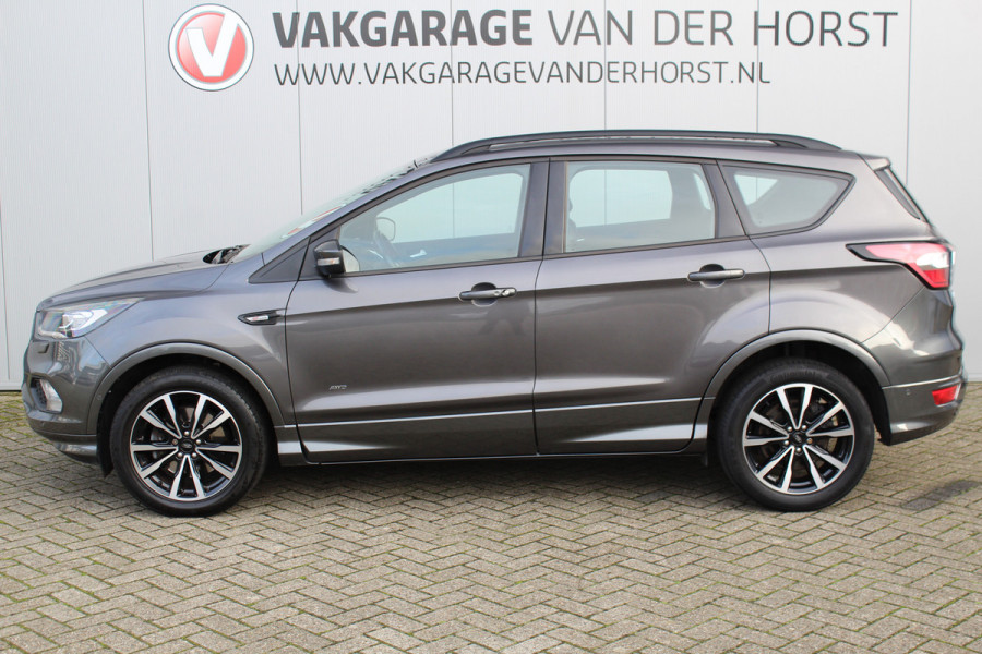 Ford Kuga 1.5-182pk EcoBoost ST-Line AWD-AUTOMAAT. Ideale caravantrekker: vierwielaangedreven automaat, trekgewicht 1.850kg ! Autm. airco dual, adapt. cruise cntrl, navigatie, telefoonvoorb., stoel- en voorraamverw., bi-xenon verl., lm wielen, camera, pdc v+a, Sony soundsyst., side- en laneassist etc.