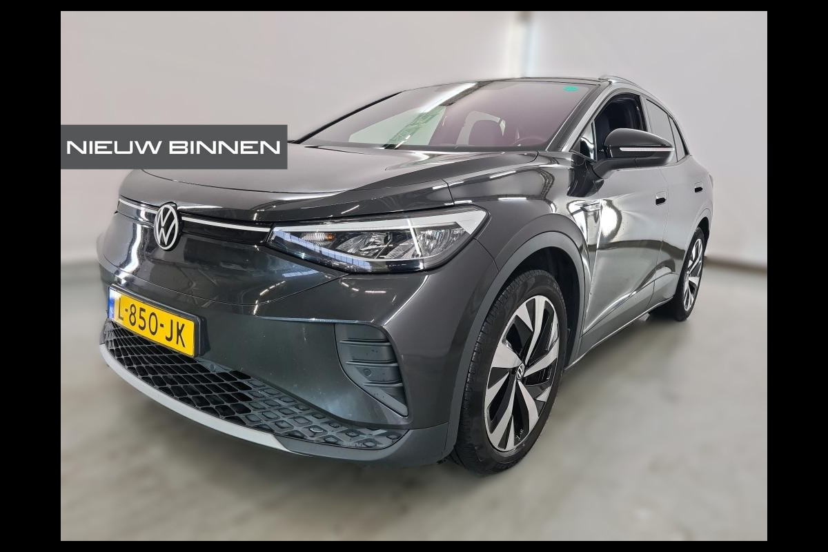 Volkswagen ID.4 First 77 kWh | Stoelverwarming | Stuurverwarming | Trekhaak | Warmtepomp | Adaptive Cruise Control | Navigatie | Apple Carplay | Keyless | Camera | Parkersensoren |