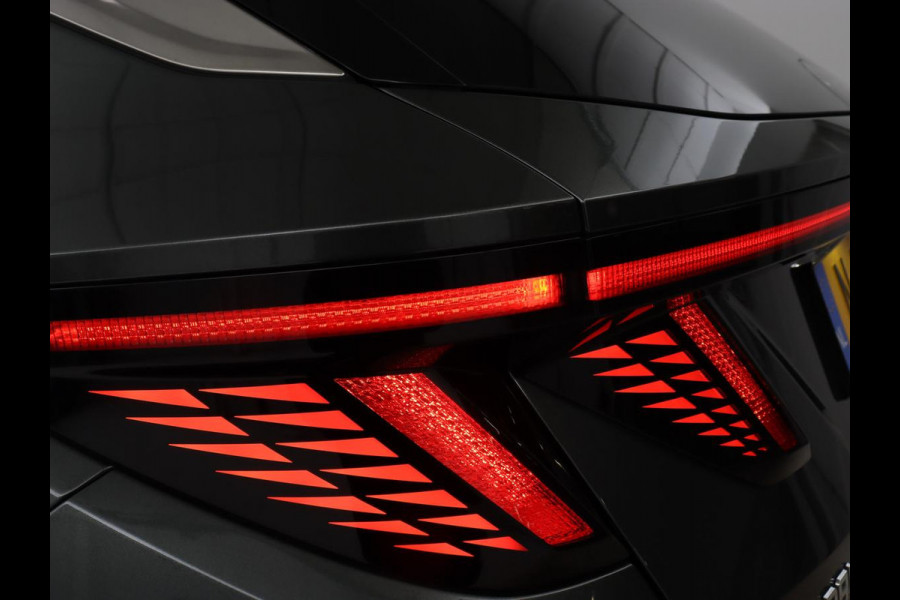 Hyundai Tucson 1.6 T-GDI HEV Premium Sky | Panoramadak | Trekhaak | Stoelventilatie | 360 Camera | Leder | Adaptive cruise | Achterbankverwarming | Carplay | Keyless | Navigatie | 19'' | File Assistent