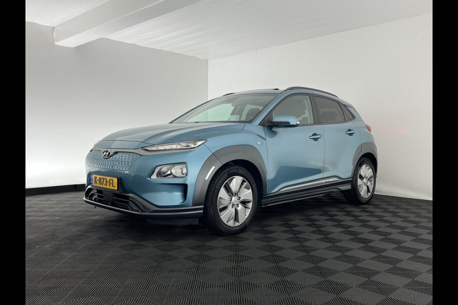 Hyundai Kona EV Fashion 64 kWh [ 3-Fase ] { SOH-100% } (INCL-BTW) Aut. *PANO | KRELL-AUDIO | HEAD-UP | NAVI-FULLMAP | KEYLESS | SHIFT-PADDLES | LANE-ASSIST | BLIND-SPOT | CAMERA | DAB | ECC | PDC | ADAPTIVE-CRUISE | COMFORT-SEATS | 17"ALU*