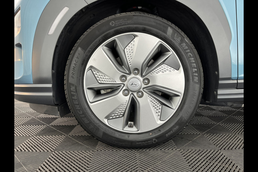 Hyundai Kona EV Fashion 64 kWh [ 3-Fase ] { SOH-100% } (INCL-BTW) Aut. *PANO | KRELL-AUDIO | HEAD-UP | NAVI-FULLMAP | KEYLESS | SHIFT-PADDLES | LANE-ASSIST | BLIND-SPOT | CAMERA | DAB | ECC | PDC | ADAPTIVE-CRUISE | COMFORT-SEATS | 17"ALU*