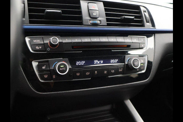 BMW 1-serie M140i 340 PK M-SPORT AUT8 + HARMAN/KARDON | 19 INCH | SPORTUITLAAT | CAMERA | STOELVERWARMING