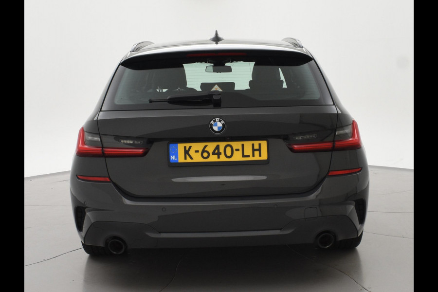 BMW 3 Serie Touring 318i AUT. M-SPORT DRAVITGRAU + SPORTSTOELEN | CAMERA | MEMORY | HIFI | SFEERVERLICHTING | CARPLAY
