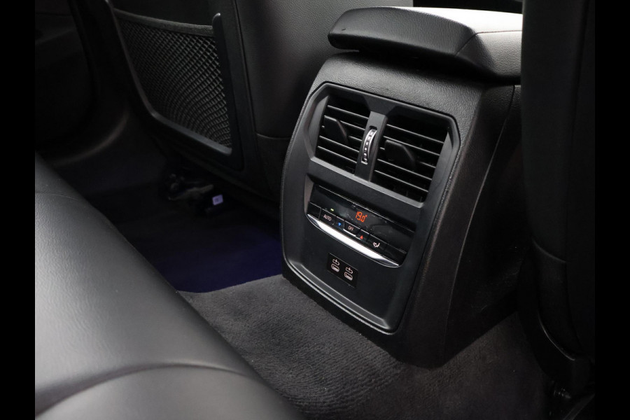 BMW 3 Serie Touring 318i AUT. M-SPORT DRAVITGRAU + SPORTSTOELEN | CAMERA | MEMORY | HIFI | SFEERVERLICHTING | CARPLAY