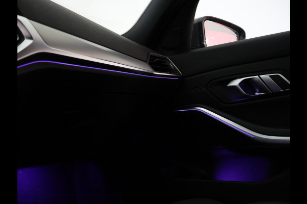 BMW 3 Serie Touring 318i AUT. M-SPORT DRAVITGRAU + SPORTSTOELEN | CAMERA | MEMORY | HIFI | SFEERVERLICHTING | CARPLAY