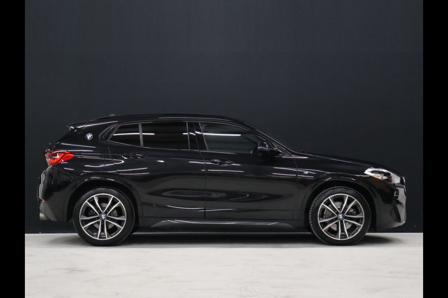 BMW X2 sDrive20i M Sport [TREKHAAK AFNEEMBAAR, MEMORY SEATS, APPLE CARPLAY, HARMAN/KARDON, HEAD-UP DISPLAY, SFEERVERLICHTING, PDC MET CAMERA, STOELVERWARMING, ELEKTRISCHE ACHTERKLEP, CRUISE CONTROL, NIEUWSTAAT]