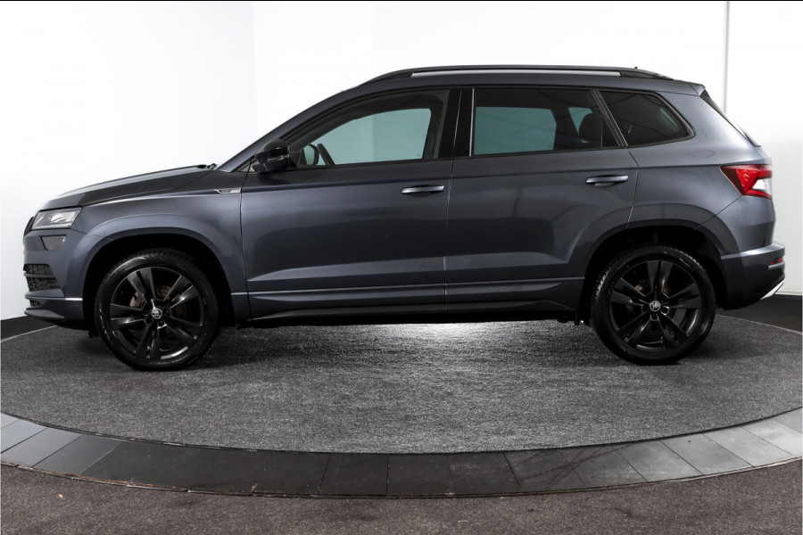 Škoda Karoq 1.5 TSI ACT 150 PK Sportline Business - Automaat | Trekhaak | Dig.Cockpit | Adapt.Cruise | Stoel-+Stuurverw. | Camera+PDC | NAV+App | LM 18'' |