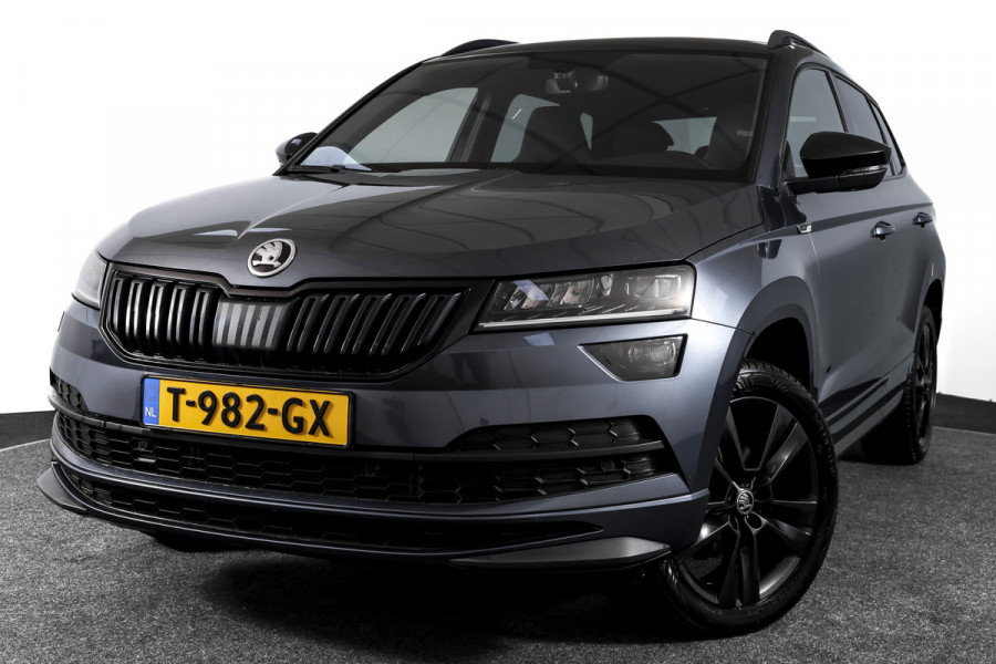 Škoda Karoq 1.5 TSI ACT 150 PK Sportline Business - Automaat | Trekhaak | Dig.Cockpit | Adapt.Cruise | Stoel-+Stuurverw. | Camera+PDC | NAV+App | LM 18'' |