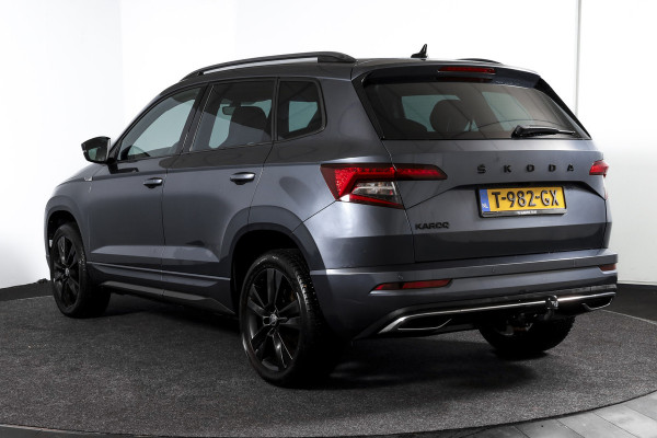 Škoda Karoq 1.5 TSI ACT 150 PK Sportline Business - Automaat | Trekhaak | Dig.Cockpit | Adapt.Cruise | Stoel-+Stuurverw. | Camera+PDC | NAV+App | LM 18'' |