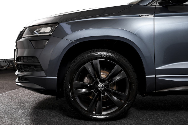 Škoda Karoq 1.5 TSI ACT 150 PK Sportline Business - Automaat | Trekhaak | Dig.Cockpit | Adapt.Cruise | Stoel-+Stuurverw. | Camera+PDC | NAV+App | LM 18'' |