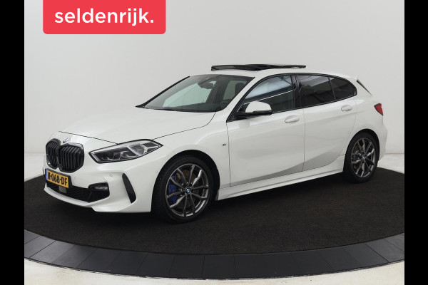 BMW 1-serie 118i High Executive | M Sport | Panoramadak | Head-Up | Leder | Harman/Kardon | Camera | Carplay | Stoelverwarming | Live Cockpit | Sfeerverlichting | Keyless | Navigatie | Sportstoelen | Full LED