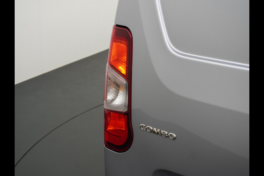 Opel Combo 1.5D 102PK L1H1 Pdc Airco ECC Cruise Control Lichtsensor Schuifdeur Betonplex vloer Lat om Lat Betimmering Tussenwand Euro 6