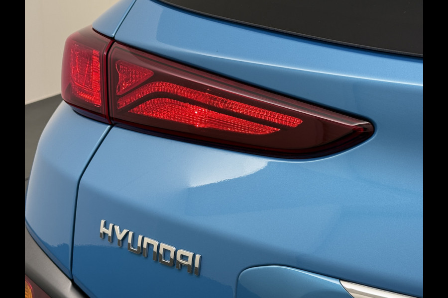 Hyundai Kona 1.6 HEV AUT-6 141pk Adaptive-Cr Trekhaak HUD Camera Android Apple Carplay Navi Bordherkenning PDC Fashion Keyless Head-Up-Display Auto-Pilot (Lane-Assist+ACC) ESP Mild Hybride Priv.Glass Botsing waarsch syst Dodehoek-assistent