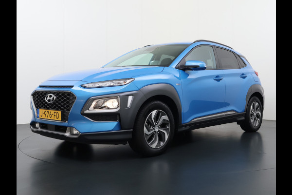 Hyundai Kona 1.6 HEV AUT-6 141pk Adaptive-Cr Trekhaak HUD Camera Android Apple Carplay Navi Bordherkenning PDC Fashion Keyless Head-Up-Display Auto-Pilot (Lane-Assist+ACC) ESP Mild Hybride Priv.Glass Botsing waarsch syst Dodehoek-assistent